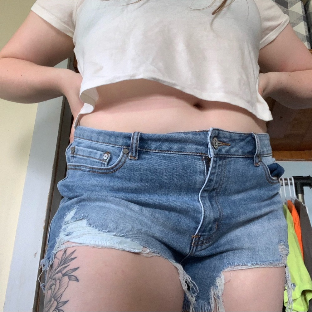Distressed denim shorts
